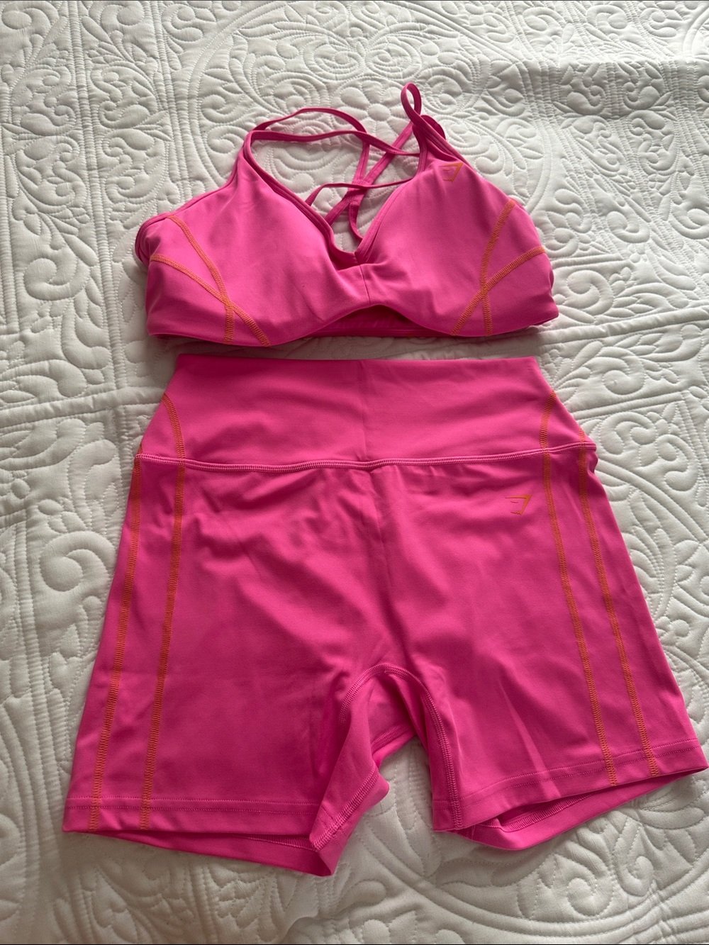 Gymshark Hot Pink Sports Bra and Shorts Set with Orange Stitching